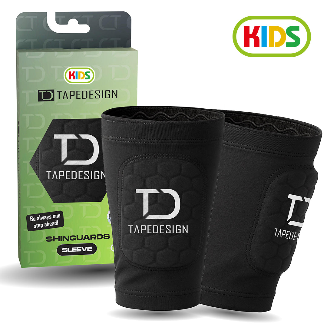 TAPEDESIGN Shinguards Sleeve KIDS in Schwarz mit Verpackung – leichte Schienbeinschoner Sleeves für Kinder